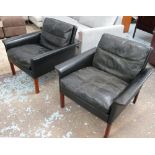 HANS OLSEN ARMCHAIRS, a pair, in black leather, with rosewood legs (with faults,