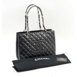 CHANEL GRAND SHOPPING TOTE, with quilted black caviar leather,