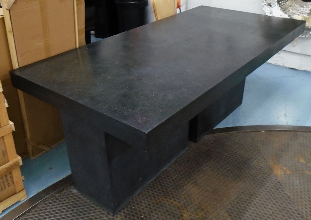TERRAZZO TABLE, in black on block supports, 214cm x 105cm x 76cm H.