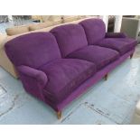GEORGE SHERLOCK SOFA, three seater, Howard style, in Andrew Martin purple fabric,