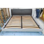 B&B ITALIA BED, with grey leather headboard on chromed feet, 215cm L x 19cm W.