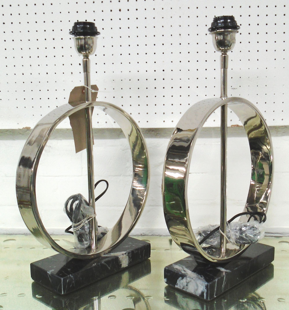 TABLE LAMPS, a pair, circular in plated metal on marble bases, 48cm H.