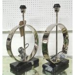 TABLE LAMPS, a pair, circular in plated metal on marble bases, 48cm H.