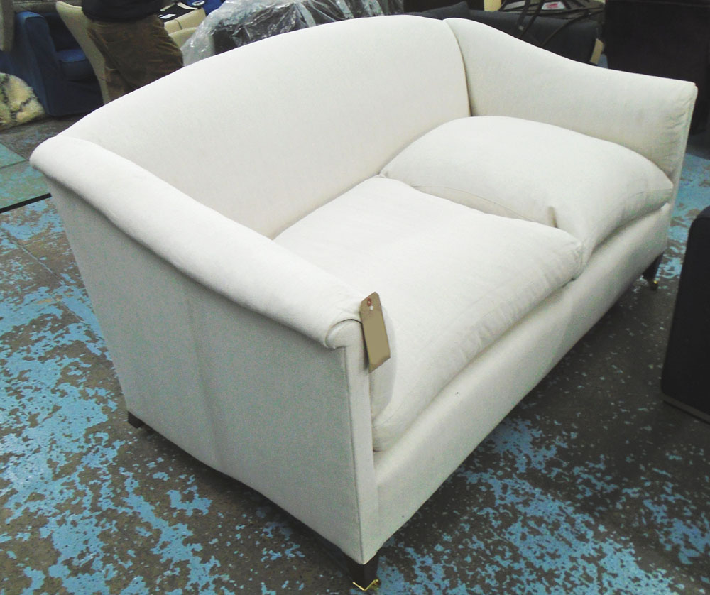 SOFA, fawn upholstered with twin seat cushions, loose covers included, 185cm W x 104cm D.