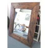 MIRROR, in a rustic wooden frame, 158cm x 121cm.