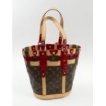 LOUIS VUITTON MONOGRAM PM RUBIS BUCKET BAG, with leather trims, crocodile texture red leather,