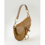 CHRISTIAN DIOR SADDLE BAG, tan leather logo medallion at the front and sides,