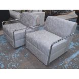 ARMCHAIRS, a pair, contemporary design, in silver silken upholstery, with tubular arms, 78cm W.