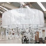 CHANDELIER, eight branches, with glass drops on a chromed metal frame and circular shade, 50cm H,