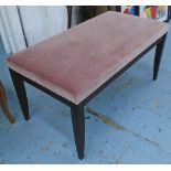 WINDOW/BED END STOOL, rectangular, pink upholstered seat, on ebonised splayed legs,