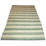 MODERNIST KILIM, 300cm x 200cm, striped design in jade and ivory.