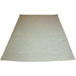 CALVIN KLEIN JUTE CARPET, 302cm x 245cm, in an oatmeal woven finish.