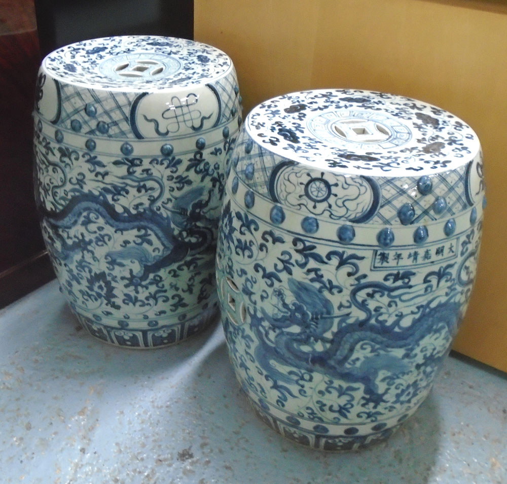 GARDEN SEATS, a pair, Chinese blue and white with dragon decoration, 32cm diam x 46cm H.