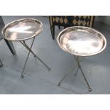 OCCASIONAL TABLES, a pair, aluminium with tray tops on folding stands, 39cm diam x 57cm H.