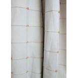 CURTAINS, a pair, in cream and beige fabric lined and interlined each gathered 176cm W x 221cm drop.