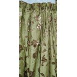 CURTAINS, a pair, floral design on a gold field, 83cm gathered by 215cm drop.