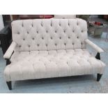 ANDREW MARTIN SOFA, with open arms and buttoned, beige upholstery, on short ebonised feet, 157.
