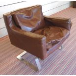 ARMCHAIR, with brown leather upholstery on chrome supports, 74cm W.