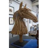 WOODEN 'HORSES HEAD' FIGURE, made from large driftwood, on metal stand, 98cm H x 87cm W.