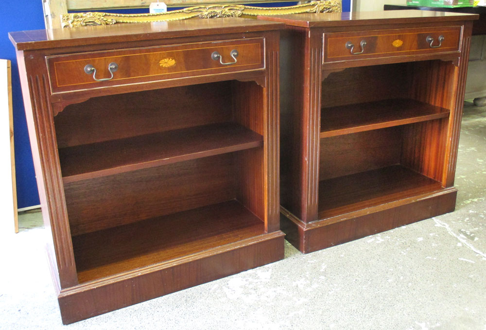 BOOKCASES, a pair, Sheraton style mahogany and inlaid each with drawer above an open shelf,