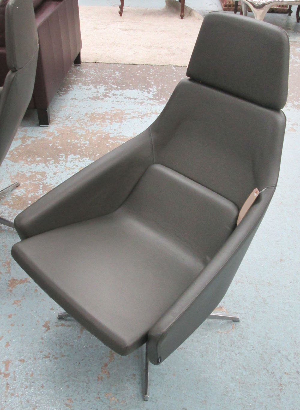 MODUS WRAP SWIVEL CHAIR, grey leather designed by Simon Pengelly, 71cm W.