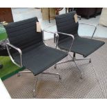 SWIVEL DESK CHAIRS, a pair, by Vitra designed by Eames with black cloth seats, 58cm W.