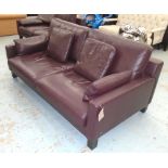 ROLF BENZ SOFA, two seater, in burgundy leather with four scatter cushions, 187cm L.