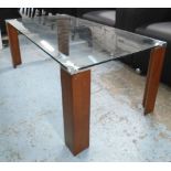 LOW TABLE, with glass top on walnut supports, 120cm x 60cm x 45cm H.