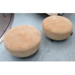 GEORGE SMITH FOOTSTOOLS, a pair, circular with suede upholstery on short square supports,