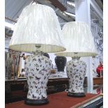 TABLE LAMPS, a pair, urn shaped with butterfly design with shades, 45cm H, plus shade.