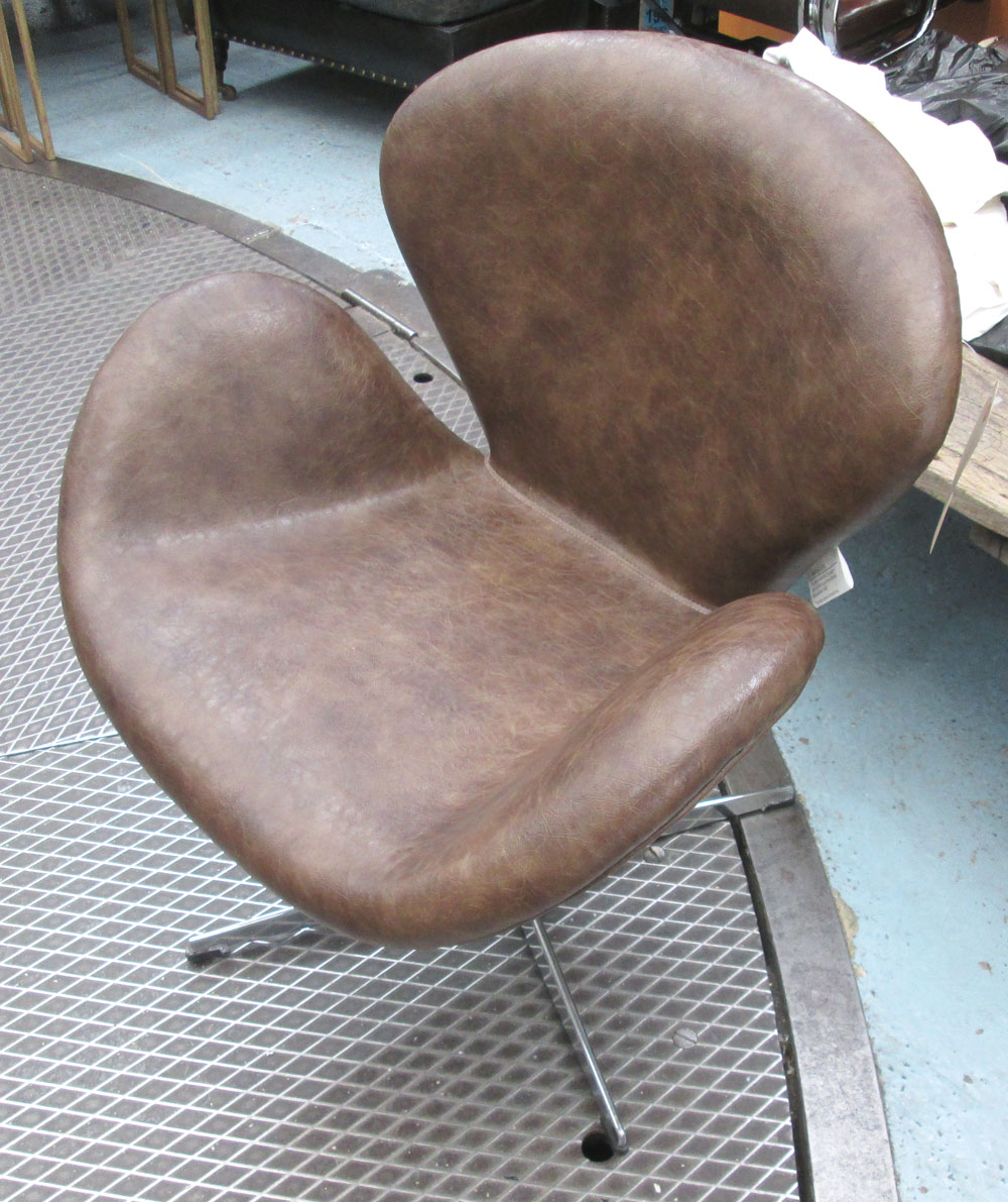 SWIVEL CHAIR, Aviation style,with a tan leather back and seat on a chromed metal frame, 70cm W.