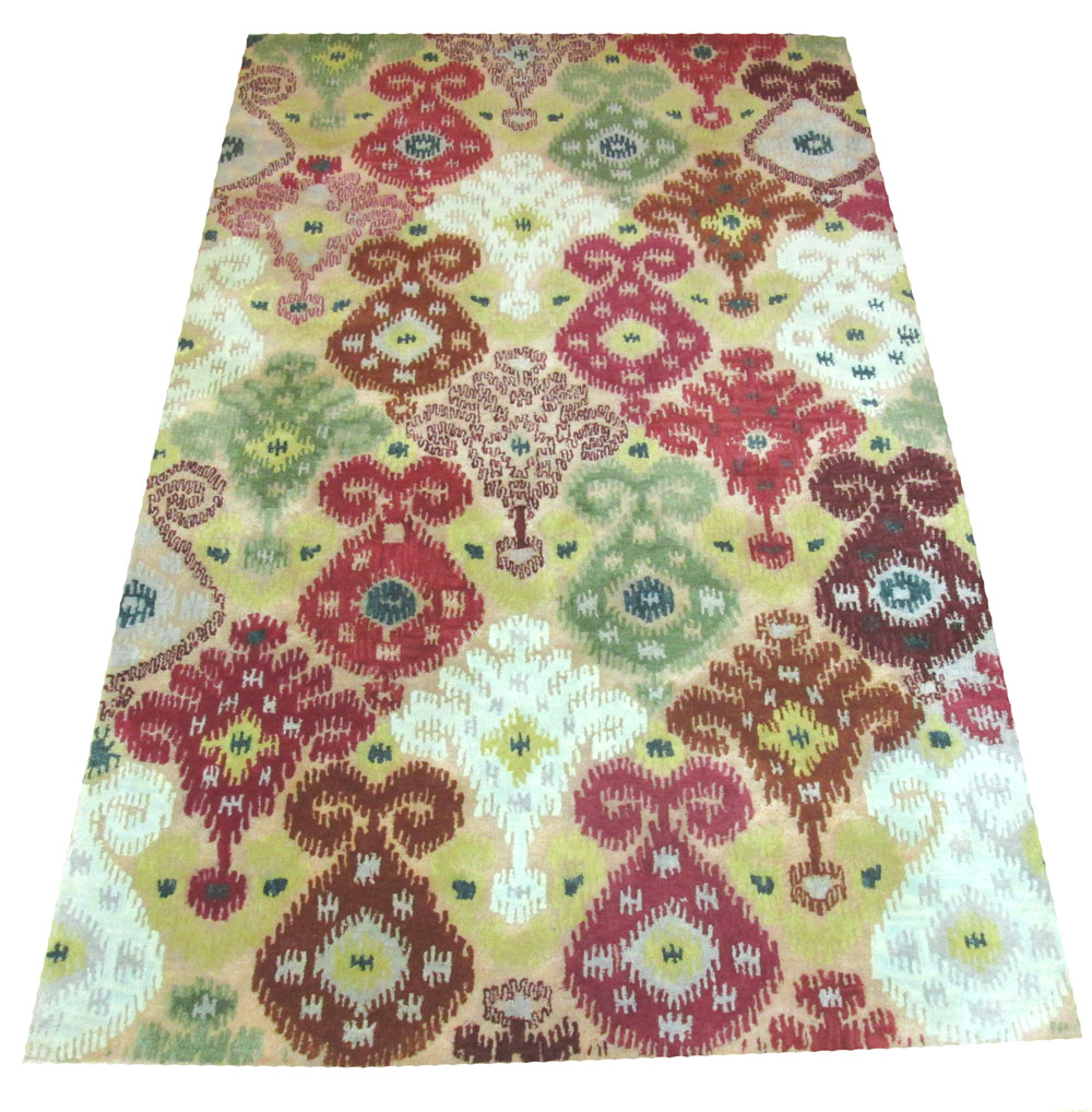 CONTEMPORARY CARPET, 250cm x 160cm, in a vibrant Ikat design.