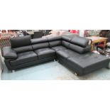 CORNER SOFA, in black leather with rising head rests on chromed metal supports, 261cm x 230cm.