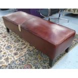 BENCH SEAT, of large proportions, tanned leather upholstery on square wooden supports,