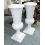 GARDEN URNS, a pair, in white resin, 121cm H.
