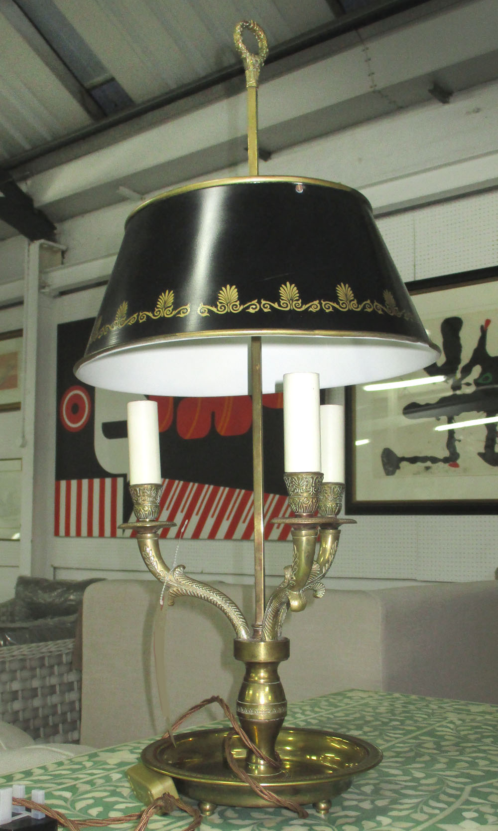 BOUILLOUTE LAMP, brass, with three sconces and black metal shades.