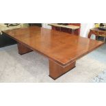 DINING TABLE, walnut with a rectangular top on twin pedestals, 279cm L x 76cm H x 129cm D.