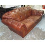 CHESTERFIELD SOFA, two seater, in antique effect buttoned tanned leather, 223cm L.