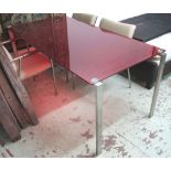 DINING TABLE, with red glass top on chromed metal supports by Zer Italia, 178cm x 87cm x 74cm H.