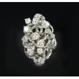 DIAMOND AND WHITE GOLD SPRAY RING thirteen round brilliant cut diamonds entwined in a nest of 14K