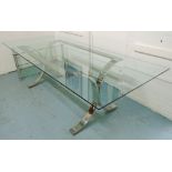 DINING TABLE, with a rectangular glass top on a chrome base with scrolled 'X' framed supports,
