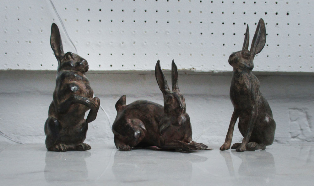 P. CHENET BRONZE HARES, three, signed.