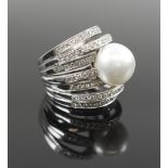 PEARL AND DIAMOND MULTIBAND RING pave diamonds centering a large ivory pearl, cultured, unmarked,