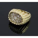 18K GOLD AND DIAMOND SIGNET RING, pave set diamonds mounted in 18K gold bark finish, ring size 4/4.