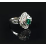 EMERALD AND DIAMOND BALLERINA RING emerald cut emerald encircled with round brilliant cut and