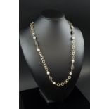 PEARL AND DIAMOND ROPE NECKLACE baroque pearls and diamond set beads and a gold plated silver chain