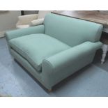 ARMCHAIR, 'Winslow' by Terence Conran, in aquamarine upholstery, on turned supports castors to back,