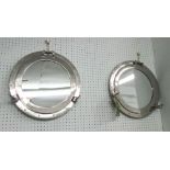 WALL MIRRORS, a pair, porthole style, circular polished metal, each 43cm W.