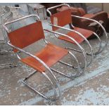 ARMCHAIRS, a pair, in the style of Mies Van Der Rohe in tanned leather on a chromed metal frame,