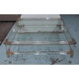 OCCASIONAL TABLE, with glass top on a perspex base, 100cm x 100cm x 41cm.